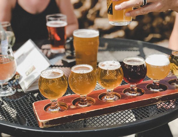 downtown flagstaff restaurant table serving beer to patrons